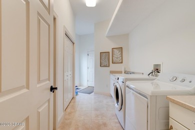 Beautiful 3-bedroom, 2.5-bath home with a den/study that could on Halifax Plantation Golf Club in Florida - for sale on GolfHomes.com, golf home, golf lot