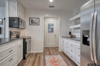 Stunningly remodeled Hideaway gem--now better than ever! on Hide-A-Way Lake Golf Course in Texas - for sale on GolfHomes.com, golf home, golf lot
