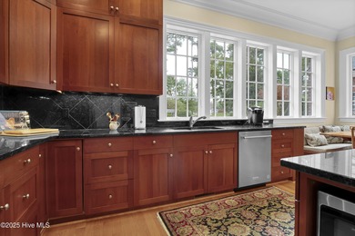 Gorgeous custom-built brick home on a 0.71 acre lot on fairway on Country Club of Landfall in North Carolina - for sale on GolfHomes.com, golf home, golf lot