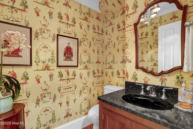 Gorgeous custom-built brick home on a 0.71 acre lot on fairway on Country Club of Landfall in North Carolina - for sale on GolfHomes.com, golf home, golf lot