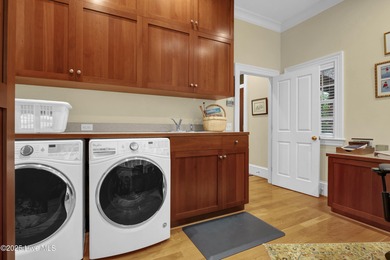 Gorgeous custom-built brick home on a 0.71 acre lot on fairway on Country Club of Landfall in North Carolina - for sale on GolfHomes.com, golf home, golf lot