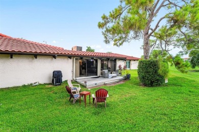This impeccably remodeled 3 bdr residence is a true standout In on Woodmont Country Club in Florida - for sale on GolfHomes.com, golf home, golf lot