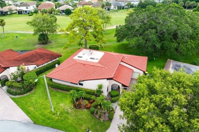 This impeccably remodeled 3 bdr residence is a true standout In on Woodmont Country Club in Florida - for sale on GolfHomes.com, golf home, golf lot