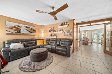 This delightful 3-bedroom, 3-bath home with a spectacular den on Fiddlesticks Country Club in Florida - for sale on GolfHomes.com, golf home, golf lot