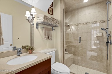 Gorgeous custom-built brick home on a 0.71 acre lot on fairway on Country Club of Landfall in North Carolina - for sale on GolfHomes.com, golf home, golf lot