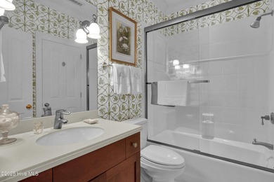 Gorgeous custom-built brick home on a 0.71 acre lot on fairway on Country Club of Landfall in North Carolina - for sale on GolfHomes.com, golf home, golf lot