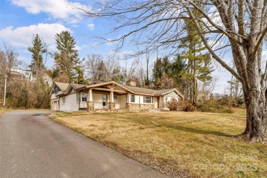 ENJOY LIFE ON THE GOLF COURSE in this 3-br/2-ba home on over on Country Club of Asheville in North Carolina - for sale on GolfHomes.com, golf home, golf lot