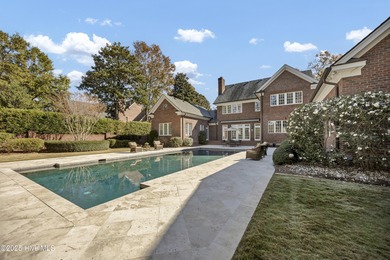 Gorgeous custom-built brick home on a 0.71 acre lot on fairway on Country Club of Landfall in North Carolina - for sale on GolfHomes.com, golf home, golf lot