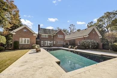 Gorgeous custom-built brick home on a 0.71 acre lot on fairway on Country Club of Landfall in North Carolina - for sale on GolfHomes.com, golf home, golf lot