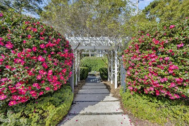 Gorgeous custom-built brick home on a 0.71 acre lot on fairway on Country Club of Landfall in North Carolina - for sale on GolfHomes.com, golf home, golf lot