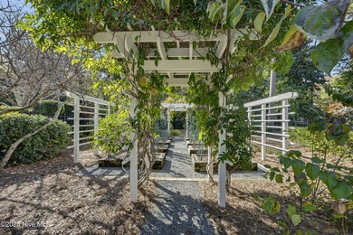 Gorgeous custom-built brick home on a 0.71 acre lot on fairway on Country Club of Landfall in North Carolina - for sale on GolfHomes.com, golf home, golf lot