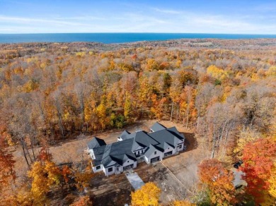 Discover luxury living at 809 Fairways Drive. Located in the on Birchwood Farms Golf and Country Club in Michigan - for sale on GolfHomes.com, golf home, golf lot