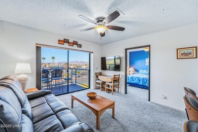 LOCATED IN THE LUXURIOUS QUEENS BAY RESORT! This beautifully on London Bridge Golf Course in Arizona - for sale on GolfHomes.com, golf home, golf lot