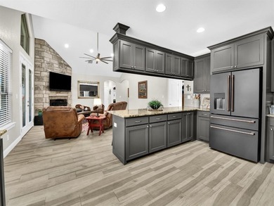 Exceptional home in Pecan Plantation featuring a private hangar on Pecan Plantation Country Club in Texas - for sale on GolfHomes.com, golf home, golf lot