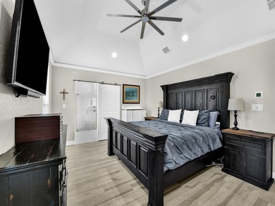 Exceptional home in Pecan Plantation featuring a private hangar on Pecan Plantation Country Club in Texas - for sale on GolfHomes.com, golf home, golf lot