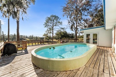 Game day just found its perfect address! Located in on Mark Bostick Golf Course At University of Florida in Florida - for sale on GolfHomes.com, golf home, golf lot