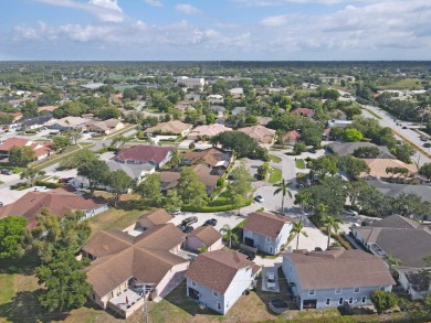 This exceptional property offers versatile options for on Greenview Cove Golf Club in Florida - for sale on GolfHomes.com, golf home, golf lot