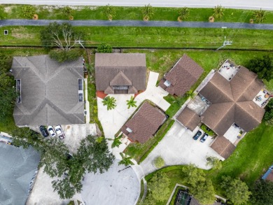 This exceptional property offers versatile options for on Greenview Cove Golf Club in Florida - for sale on GolfHomes.com, golf home, golf lot