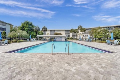 SELLERS ARE MOTIVATED! Furnished or unfurnished. Step into this on Wynmoor Golf Course in Florida - for sale on GolfHomes.com, golf home, golf lot