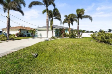 Welcome to this charming pool home on a spacious corner double on Rotonda Golf and Country Club The Palms Course in Florida - for sale on GolfHomes.com, golf home, golf lot