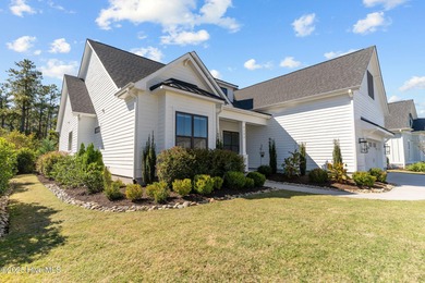 Welcome to this stunning residence nestled in the prestigious on Cape Fear National At Brunswick Forest in North Carolina - for sale on GolfHomes.com, golf home, golf lot