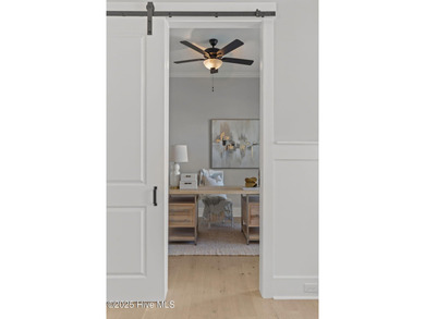 Welcome to this stunning residence nestled in the prestigious on Cape Fear National At Brunswick Forest in North Carolina - for sale on GolfHomes.com, golf home, golf lot