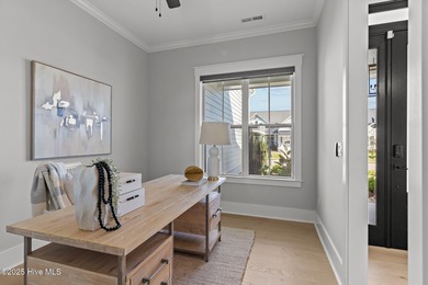 Welcome to this stunning residence nestled in the prestigious on Cape Fear National At Brunswick Forest in North Carolina - for sale on GolfHomes.com, golf home, golf lot