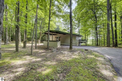 This stunning 5-Bedroom Retreat at Shanty Creek Resorts is on Shanty Creek Golf Course in Michigan - for sale on GolfHomes.com, golf home, golf lot