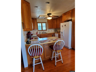 SPRAWLING RANCH STYLE HOME. This immaculately beautiful home is on Antelope Hills Golf Course in Wyoming - for sale on GolfHomes.com, golf home, golf lot