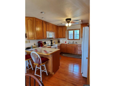 SPRAWLING RANCH STYLE HOME. This immaculately beautiful home is on Antelope Hills Golf Course in Wyoming - for sale on GolfHomes.com, golf home, golf lot