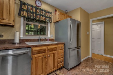 Charming Mountain Retreat Near Lake Tomahawk  Golf Course on Black Mountain Golf Course in North Carolina - for sale on GolfHomes.com, golf home, golf lot