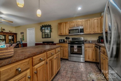 Charming Mountain Retreat Near Lake Tomahawk  Golf Course on Black Mountain Golf Course in North Carolina - for sale on GolfHomes.com, golf home, golf lot