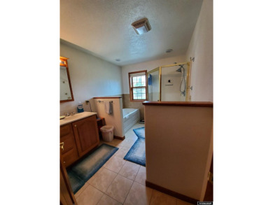 SPRAWLING RANCH STYLE HOME. This immaculately beautiful home is on Antelope Hills Golf Course in Wyoming - for sale on GolfHomes.com, golf home, golf lot