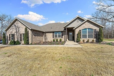 Experience this like-new construction, perfectly situated on a on Bella Vista Country Club - Highlands in Arkansas - for sale on GolfHomes.com, golf home, golf lot