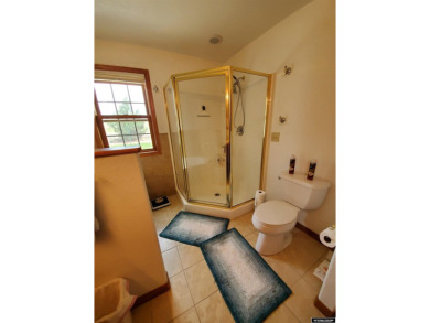 SPRAWLING RANCH STYLE HOME. This immaculately beautiful home is on Antelope Hills Golf Course in Wyoming - for sale on GolfHomes.com, golf home, golf lot