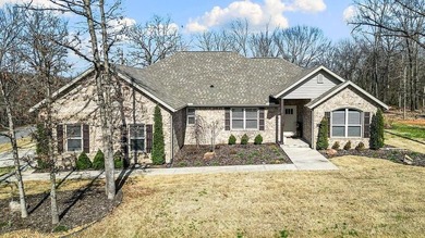 Experience this like-new construction, perfectly situated on a on Bella Vista Country Club - Highlands in Arkansas - for sale on GolfHomes.com, golf home, golf lot