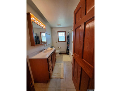 SPRAWLING RANCH STYLE HOME. This immaculately beautiful home is on Antelope Hills Golf Course in Wyoming - for sale on GolfHomes.com, golf home, golf lot
