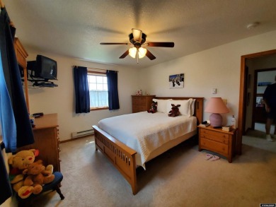 SPRAWLING RANCH STYLE HOME. This immaculately beautiful home is on Antelope Hills Golf Course in Wyoming - for sale on GolfHomes.com, golf home, golf lot