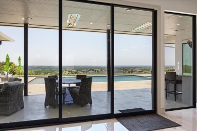 Modern Luxury-Hilltop Views! Nestled atop a hill, commanding on Canyon West Golf Club in Texas - for sale on GolfHomes.com, golf home, golf lot