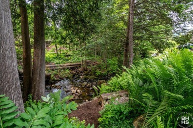 Discover unparalleled luxury in this stunning five-bedroom on Whiteface Club and Resort in New York - for sale on GolfHomes.com, golf home, golf lot