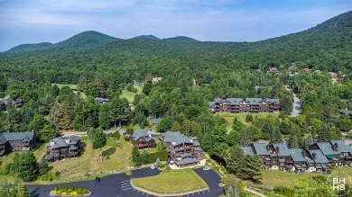 Discover unparalleled luxury in this stunning five-bedroom on Whiteface Club and Resort in New York - for sale on GolfHomes.com, golf home, golf lot