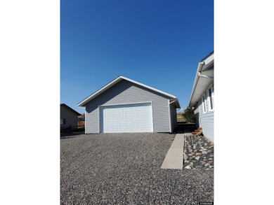 SPRAWLING RANCH STYLE HOME. This immaculately beautiful home is on Antelope Hills Golf Course in Wyoming - for sale on GolfHomes.com, golf home, golf lot