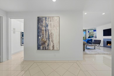 Enjoy carefree luxury living at Rancho Mirage's only high-rise on Desert Island Golf and Country Club in California - for sale on GolfHomes.com, golf home, golf lot