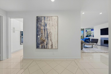 Enjoy carefree luxury living at Rancho Mirage's only high-rise on Desert Island Golf and Country Club in California - for sale on GolfHomes.com, golf home, golf lot