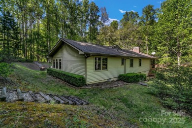 Charming Mountain Retreat Near Lake Tomahawk  Golf Course on Black Mountain Golf Course in North Carolina - for sale on GolfHomes.com, golf home, golf lot