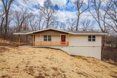 Charming remodeled home in beautiful Bella Vista--perfect for on Bella Vista - Metfield Golf Complex and Country Club in Arkansas - for sale on GolfHomes.com, golf home, golf lot