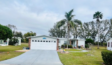 Charming 2-Bed, 2-Bath Home in Pine Lakes Country Club on Pine Lakes Country Club in Florida - for sale on GolfHomes.com, golf home, golf lot