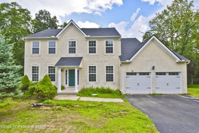 COMPLETELY RENOVATED & MOVE-IN READY! This STUNNING 4bd/2.5ba on Country Club of the Poconos Golf Course in Pennsylvania - for sale on GolfHomes.com, golf home, golf lot