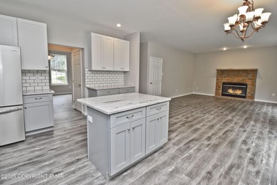 COMPLETELY RENOVATED & MOVE-IN READY! This STUNNING 4bd/2.5ba on Country Club of the Poconos Golf Course in Pennsylvania - for sale on GolfHomes.com, golf home, golf lot