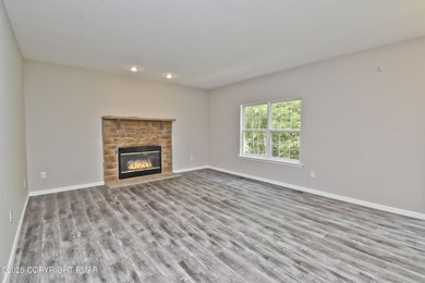 COMPLETELY RENOVATED & MOVE-IN READY! This STUNNING 4bd/2.5ba on Country Club of the Poconos Golf Course in Pennsylvania - for sale on GolfHomes.com, golf home, golf lot